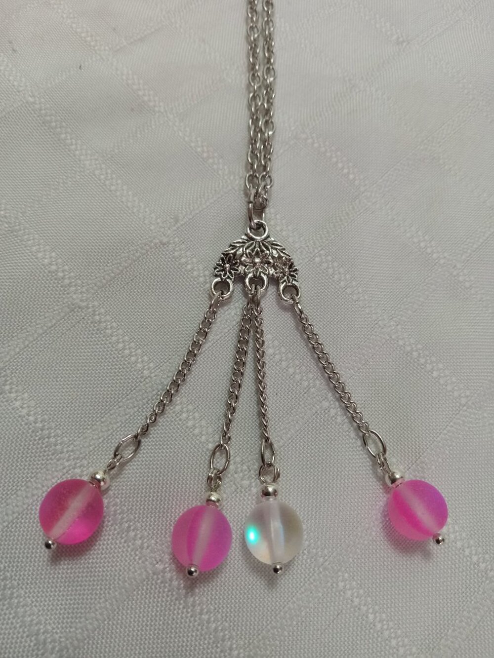 Exquisite handmade necklace featuring a gorgeous Tibetan silver charm